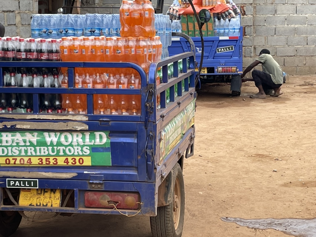 Palli-branded tricycles loaded for delivery